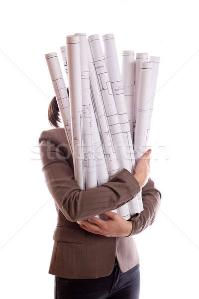 Woman holds a rolled-up drawings Stock photo © a2bb5s