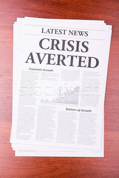 The newspaper LATEST NEWSwith the headline CRISIS AVERTED Stock photo © a2bb5s