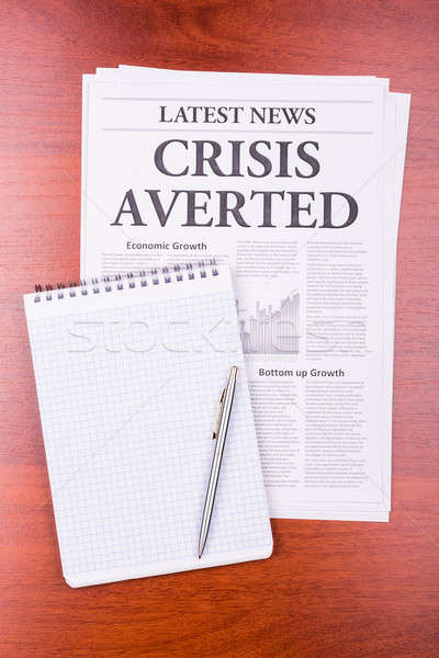 Stock photo: The newspaper CRISIS AVERTED