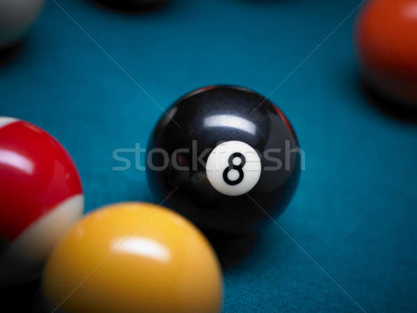 Pool balls with focus on 8 Stock photo © ABBPhoto