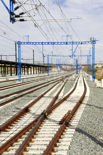 Railway with electric posts Stock photo © ABBPhoto