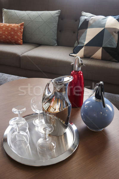 Stock photo: Pitcher and soda bottles