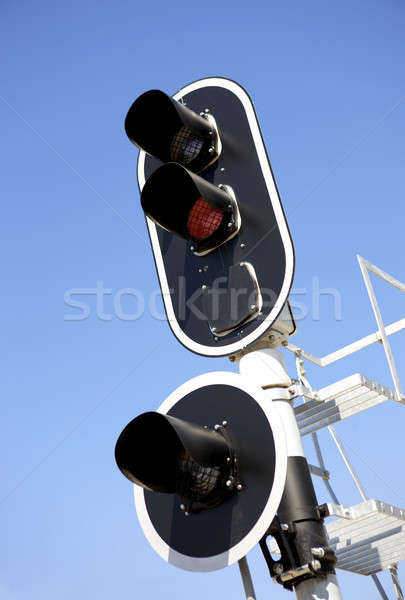 Stock photo: Railway traffic lights on blue sky