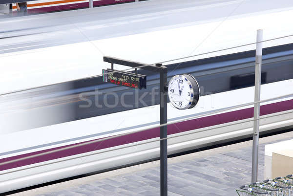 Railway station. High speed train departure. Stock photo © ABBPhoto