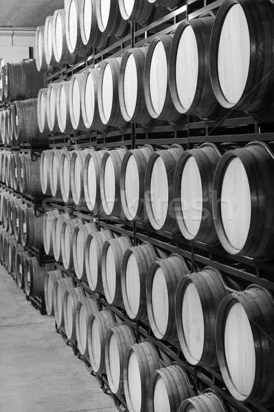 Wine barrels in an aging cellar Stock photo © ABBPhoto