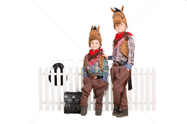 Twee jongens carnaval kostuums poseren hek Stockfoto © acidgrey