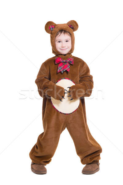 [[stock_photo]]: Peu · garçon · posant · ours · costume