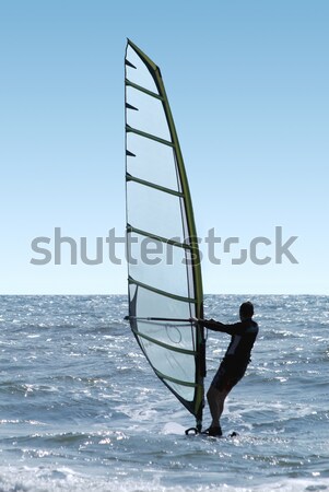 Silhouette of a windsurfer Stock photo © acidgrey