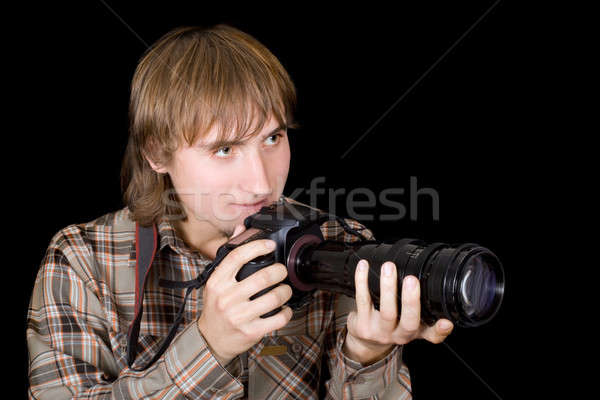 Photographer with the camera with a telefocus lens Stock photo © acidgrey
