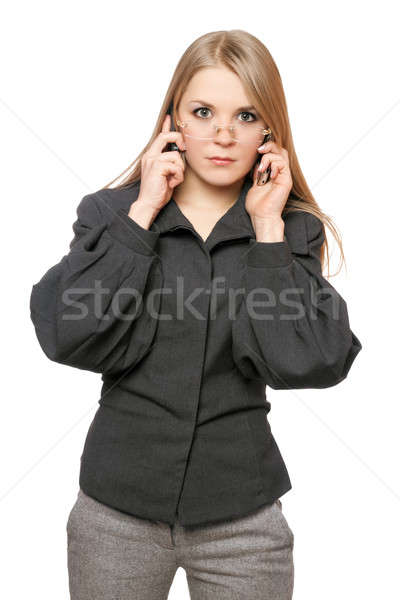 Portrait of serious young blonde in a gray business suit Stock photo © acidgrey