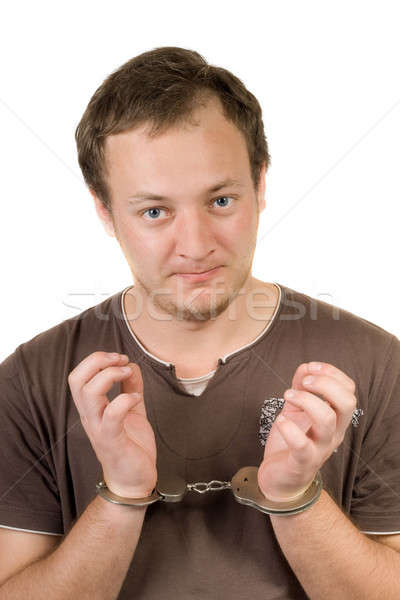 The guy chained in handcuffs. Isolated 2 Stock photo © acidgrey