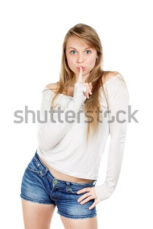Woman shows gesture to be quiet Stock photo © acidgrey