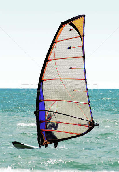 Silhouette of a windsurfer on the sea Stock photo © acidgrey