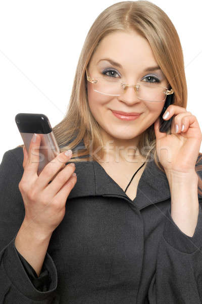 Közelkép portré mosolyog szőke nő kettő telefonok Stock fotó © acidgrey