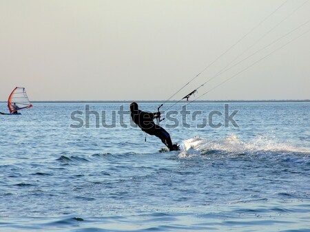 Silhouette of kite surfer Stock photo © acidgrey