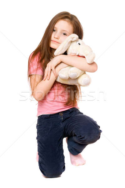 Happy little girl with a teddy elephant Stock photo © acidgrey