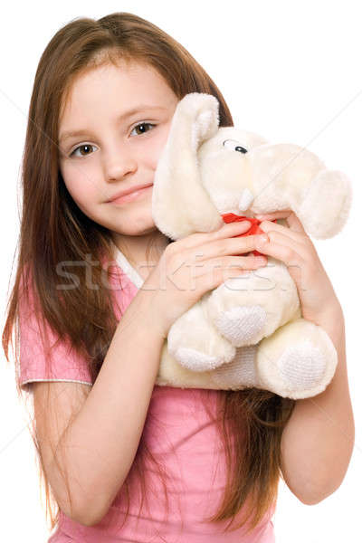 Portrait of little girl with a teddy elephant Stock photo © acidgrey