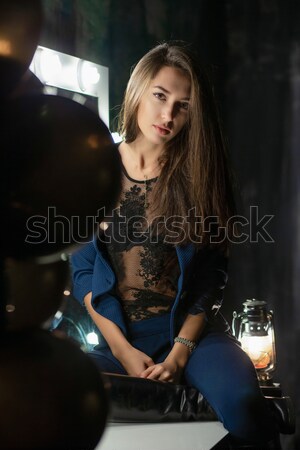 Beautiful young lady with a flask and cigarette  Stock photo © acidgrey