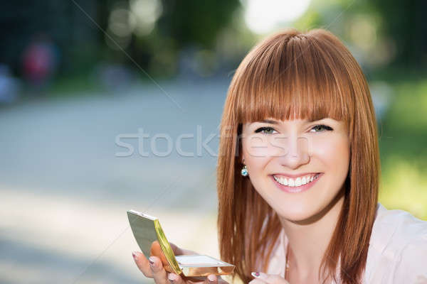 Young smiling woman Stock photo © acidgrey