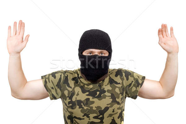 The surrendered criminal in a black mask over white Stock photo © acidgrey