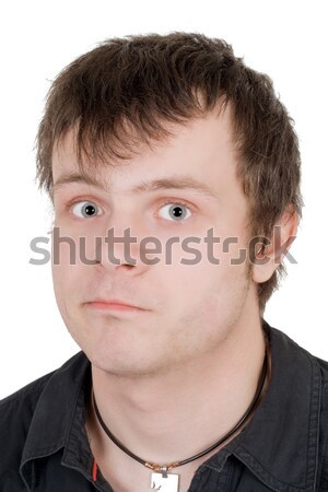 Portrait of the offended young man. Isolated Stock photo © acidgrey