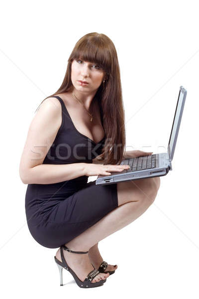 The young businesswoman sits with the laptop in a lap Stock photo © acidgrey