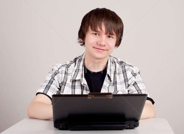 student sits for a portable computer Stock photo © adam121