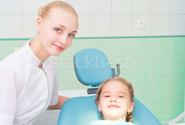 young doctor woman and girl in dentist office Stock photo © adam121