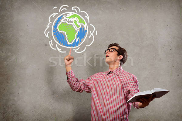 young man with a book thinks Stock photo © adam121