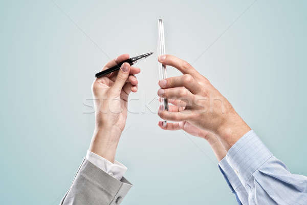 Werken cohesie zakenlieden handen mobiele telefoon Stockfoto © adam121