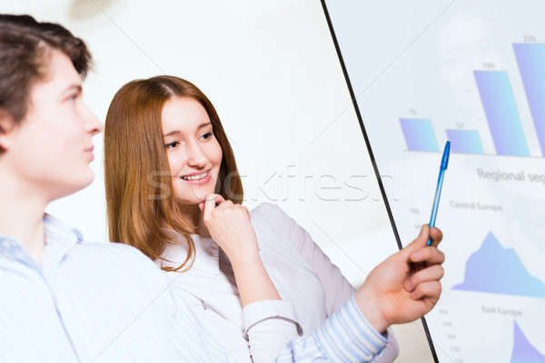 business woman with a colleague discussing reports Stock photo © adam121