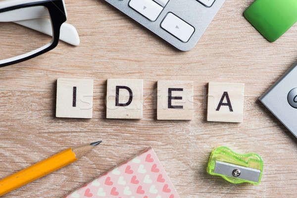 Game elements on wooden table spelling brainstorming and creative thinking idea Stock photo © adam121
