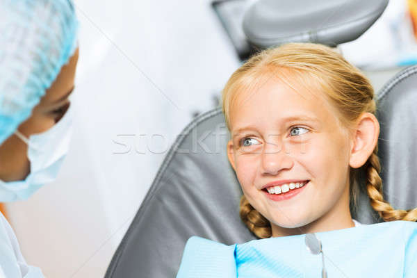 Dentist inspecting patient Stock photo © adam121