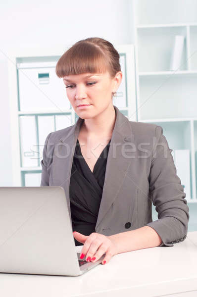 Stock photo: woman works in the office