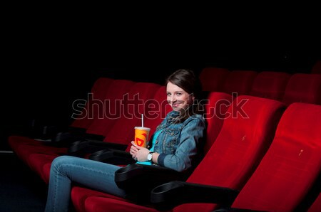 young attractive woman sitting in a cinema Stock photo © adam121