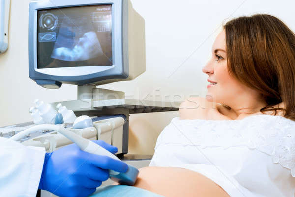 Imagine de stoc: Femeie · gravida · recepţie · medic · tineri · ultrasunete · sănătate