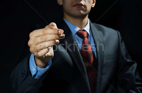 Om de afaceri monedă mână afaceri Imagine de stoc © adam121
