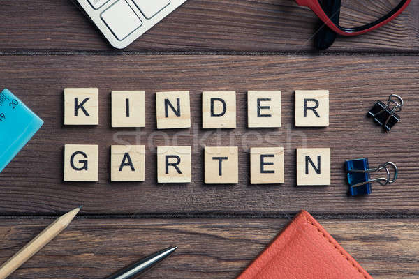 Office stuff and Kinder Garden phrase collected with letters on  Stock photo © adam121
