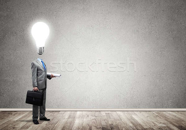 Bulb headed businessman Stock photo © adam121