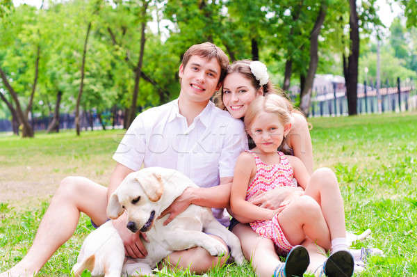 Boldog fiatal család labrador pihen park Stock fotó © adam121