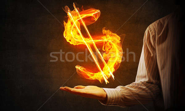 Dolar waluta ognia symbol blisko biznesmen Zdjęcia stock © adam121
