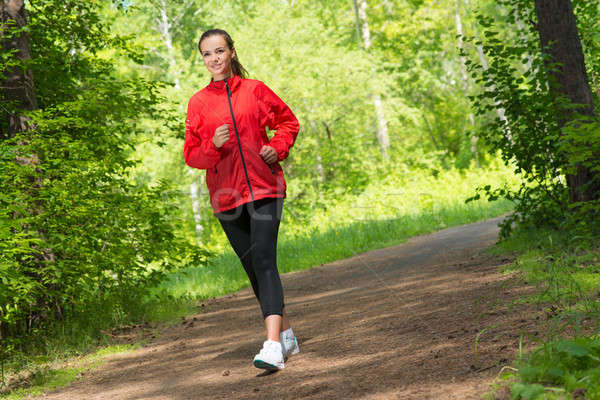 Stock photo: healthy young female athlete running