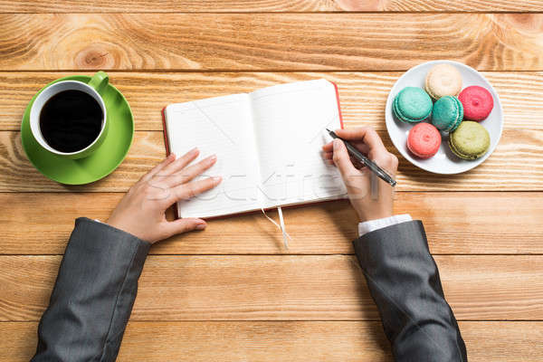 Businesswoman making some notes Stock photo © adam121