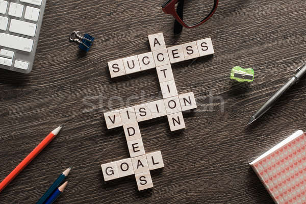 Success achieving business keywords collected of wooden cubes in crossword Stock photo © adam121