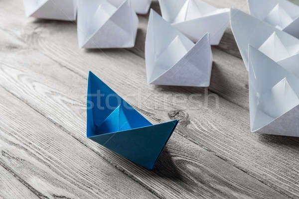 Business leadership concept with white and color paper boats on  Stock photo © adam121