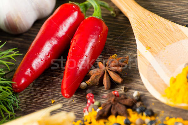 Chili kruiden specerijen liggen houten oppervlak Stockfoto © adam121