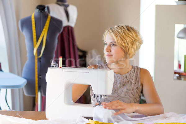 Stock photo: Seamstress at work