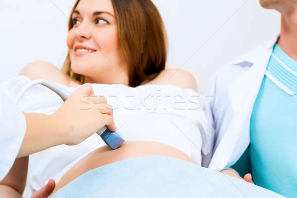 hands and abdominal ultrasound scanner Stock photo © adam121