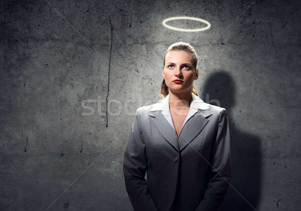 Modląc kobieta interesu młodych święty aureola powyżej Zdjęcia stock © adam121