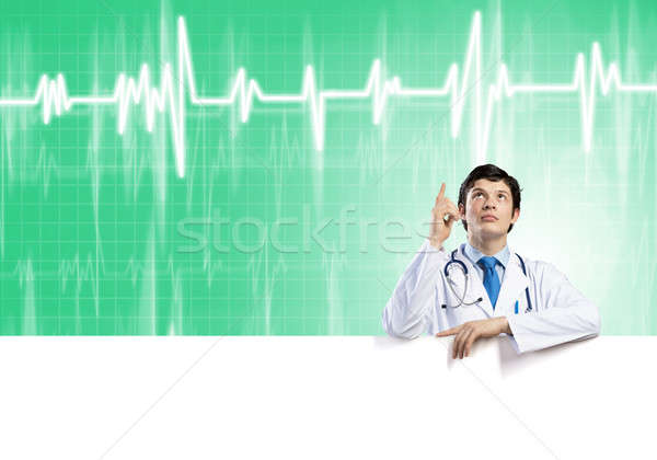 Doctor with banner Stock photo © adam121